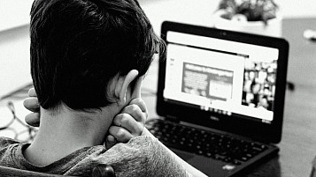 kid in front of a computer